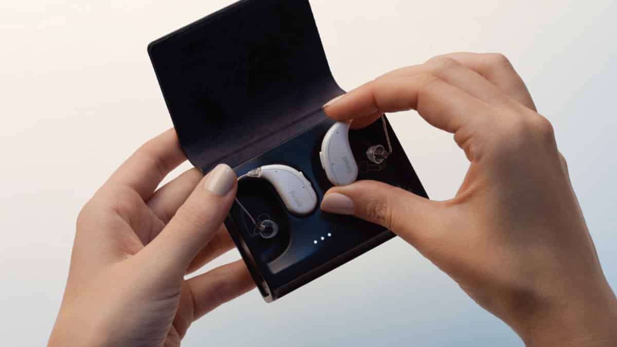 Fortell AI 2.0 receiver-in-canal hearing aid and charging case.